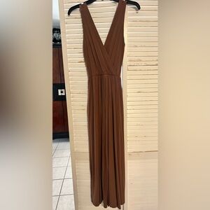 Elegant Brown Sleeveless Dress with hidden side pockets. Elastic waist